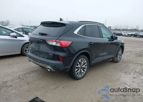 2021 Ford Escape Titanium Hybrid from USA, damaged, VIN 1FMCU9DZ0MUA82711